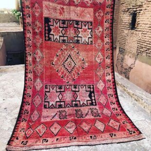 Red moroccan vintage carpet